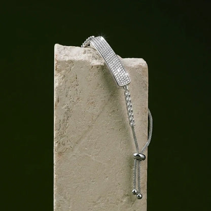 [EN] Crystal pavé bar on the silver Tetra band